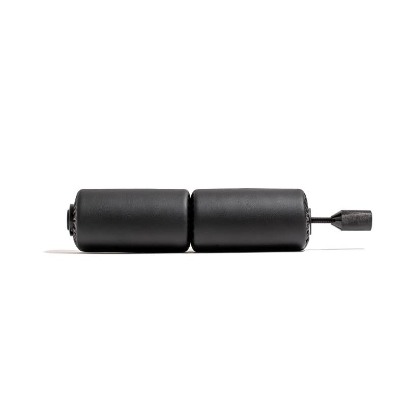 Anchor Pads product image featuring two black cylindrical pads connected by a metal screw. The product is shown from the side on a white background.